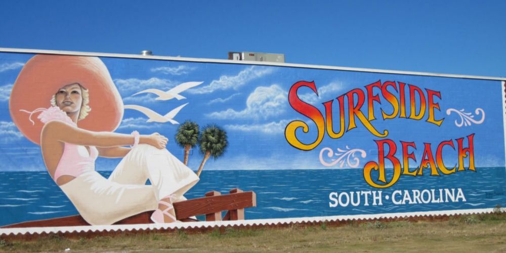 The relaxed Surfside Beach life is depicted in this beautiful locally-famous mural painted by artist Tommy Simpson.